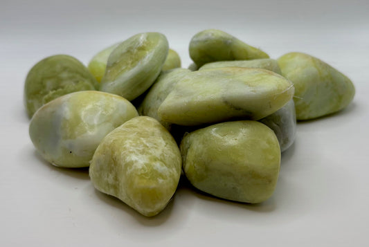 Light Green Pebbles with a white background