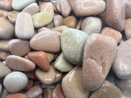 Close-up of variously sized and colored pebbles